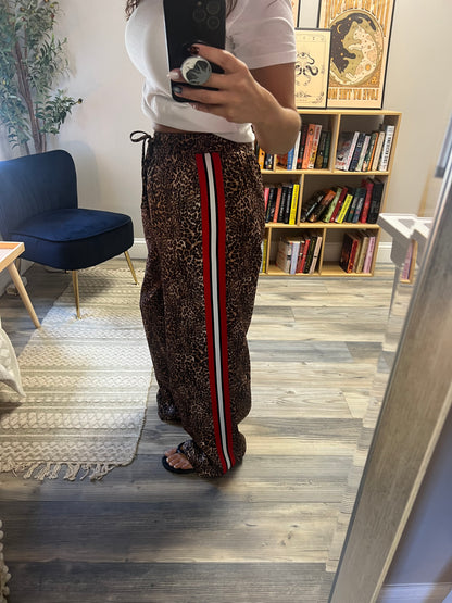 Cheetah track pants