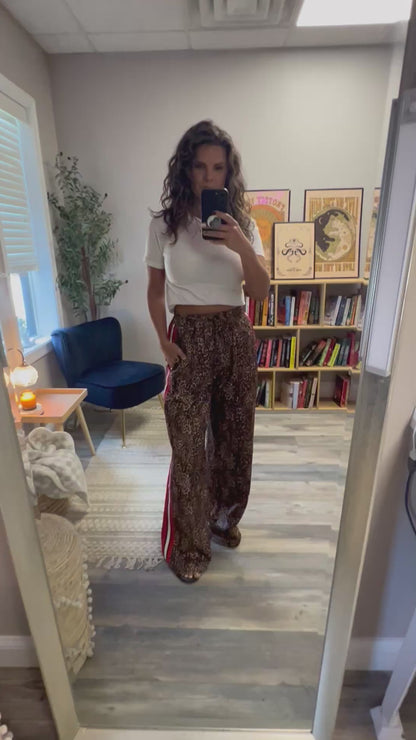 Cheetah track pants